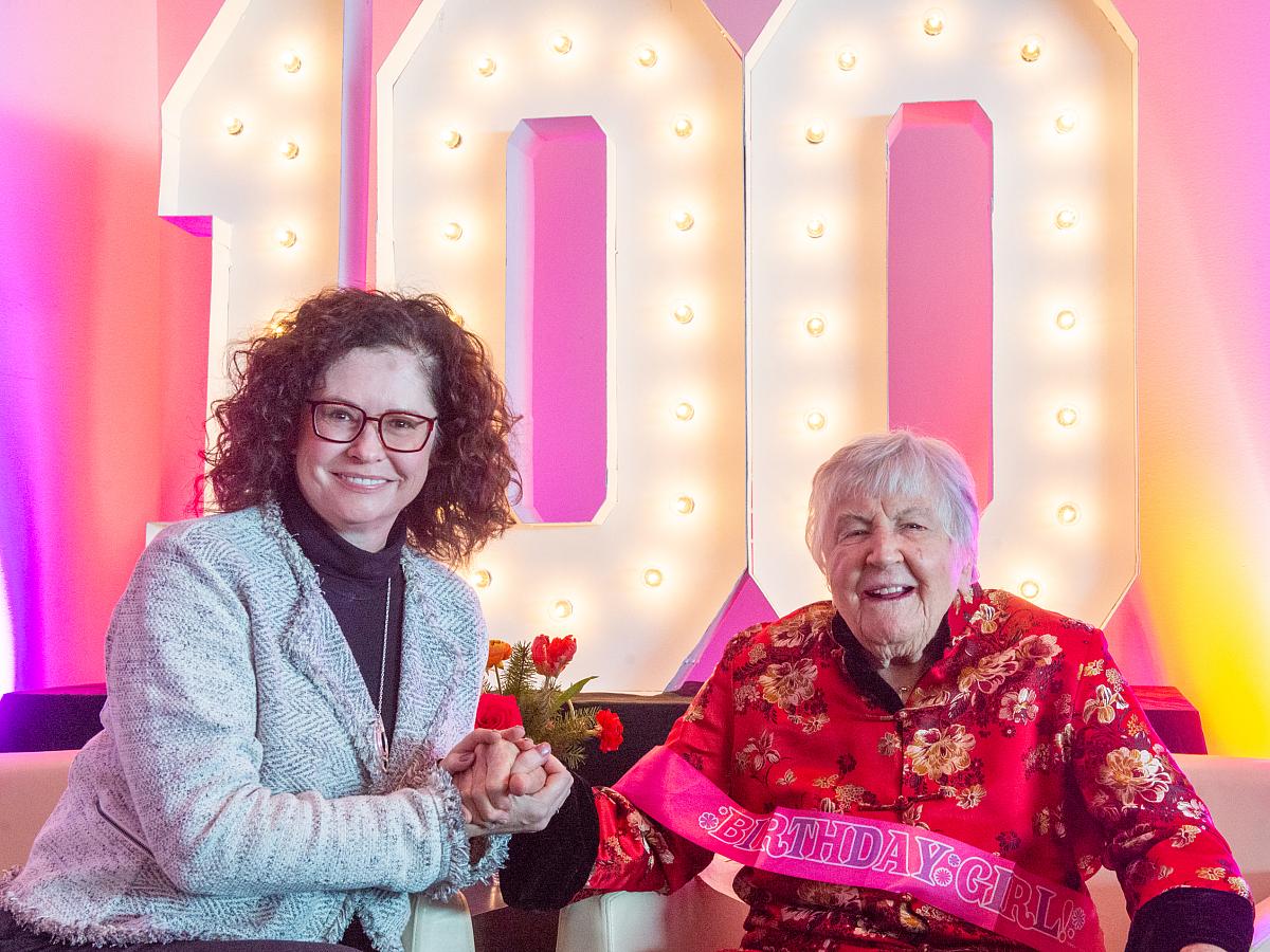 Dean Tappenden sits beside Alice Telford, as they commemorate her 100th birthday celebration.