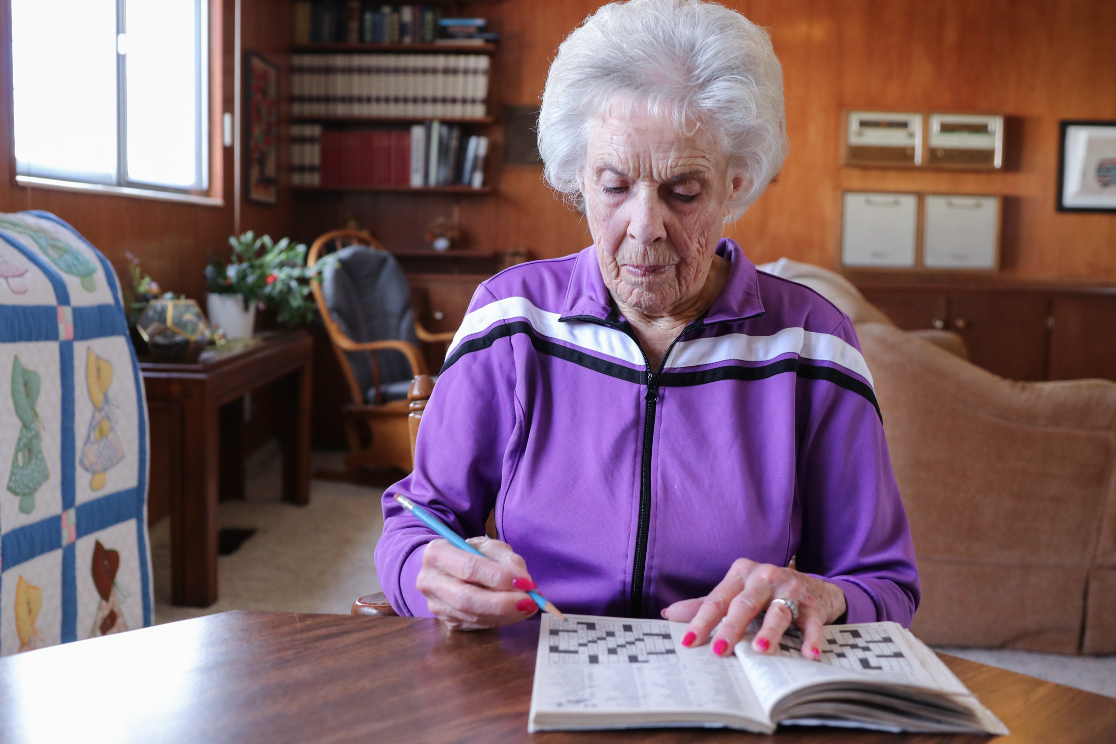 Barbara West Doing Crossword