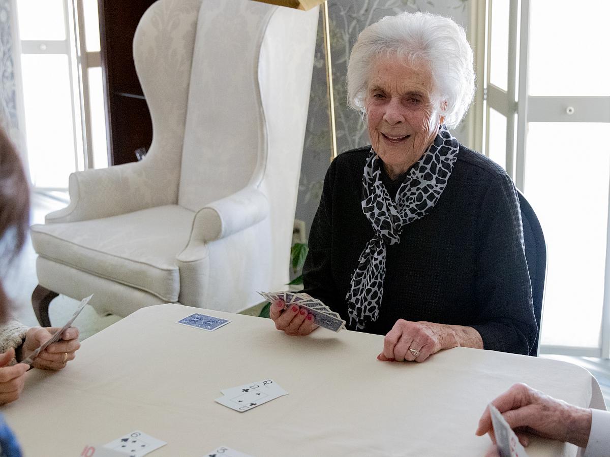 Barbara West playing Bridge with friends
