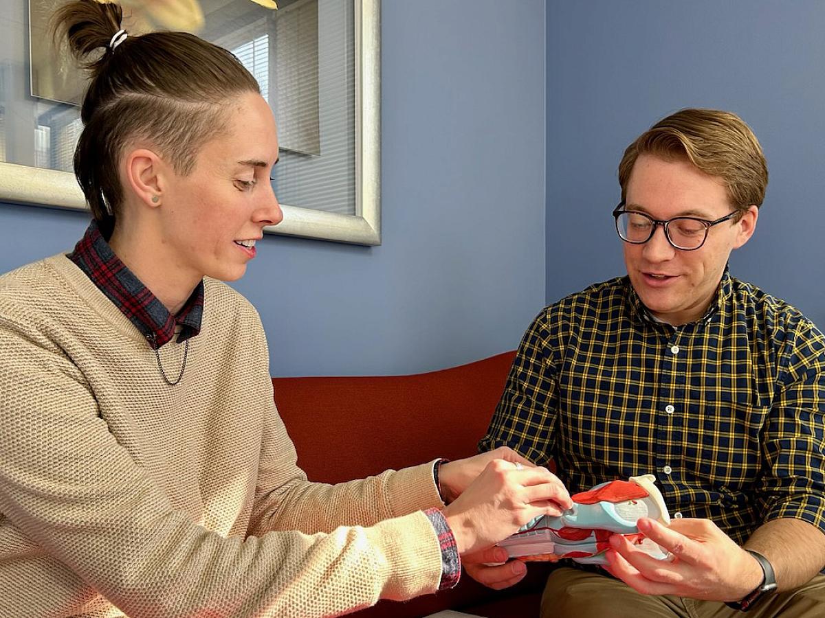 Myers works with a graduate student in the Gender-Affirming Voice Clinic