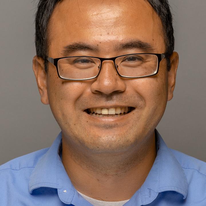 Headshot of faculty member Katsu Funai