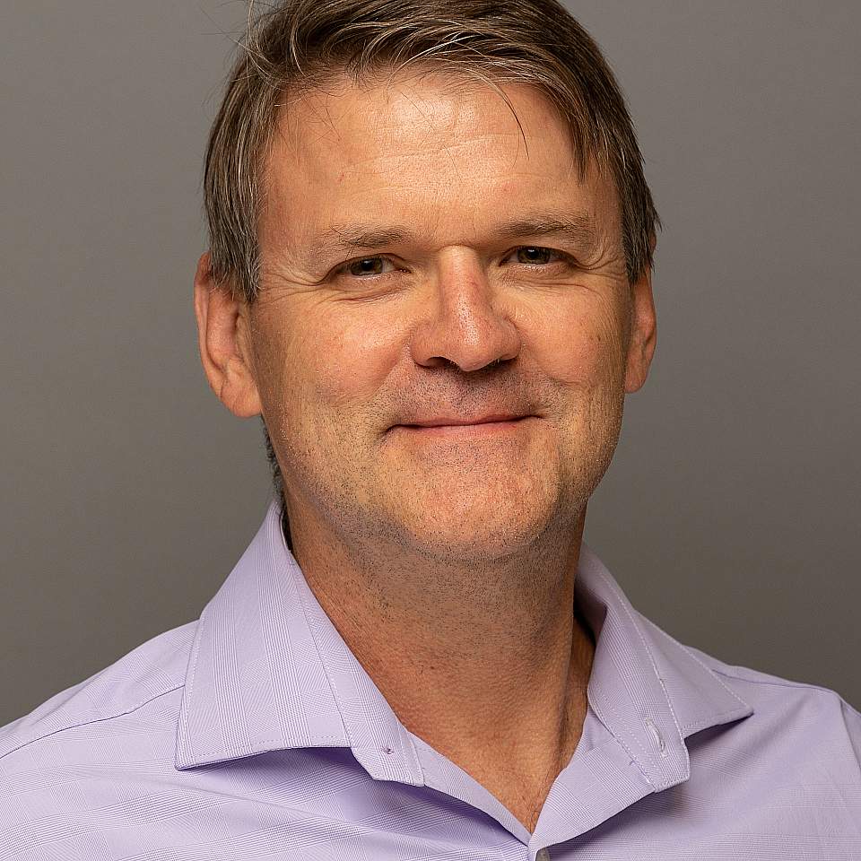 Headshot of faculty member Jake Magel