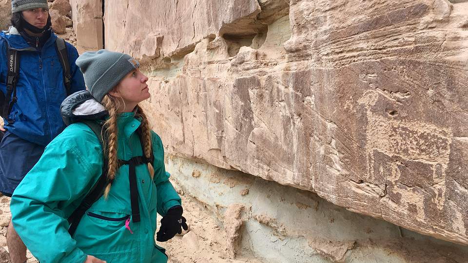 Students looking at rock art